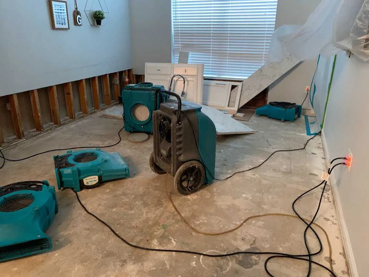 Dehumidifier in flood-cut room for Water Damage Restoration in Blackstone